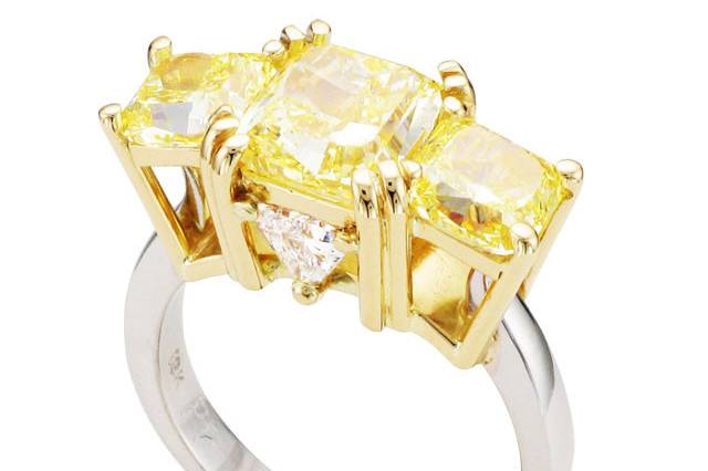 Custom two tone ring with three yellow cushion cut diamonds with triangle diamond accents by Spectrum Art & Jewelry