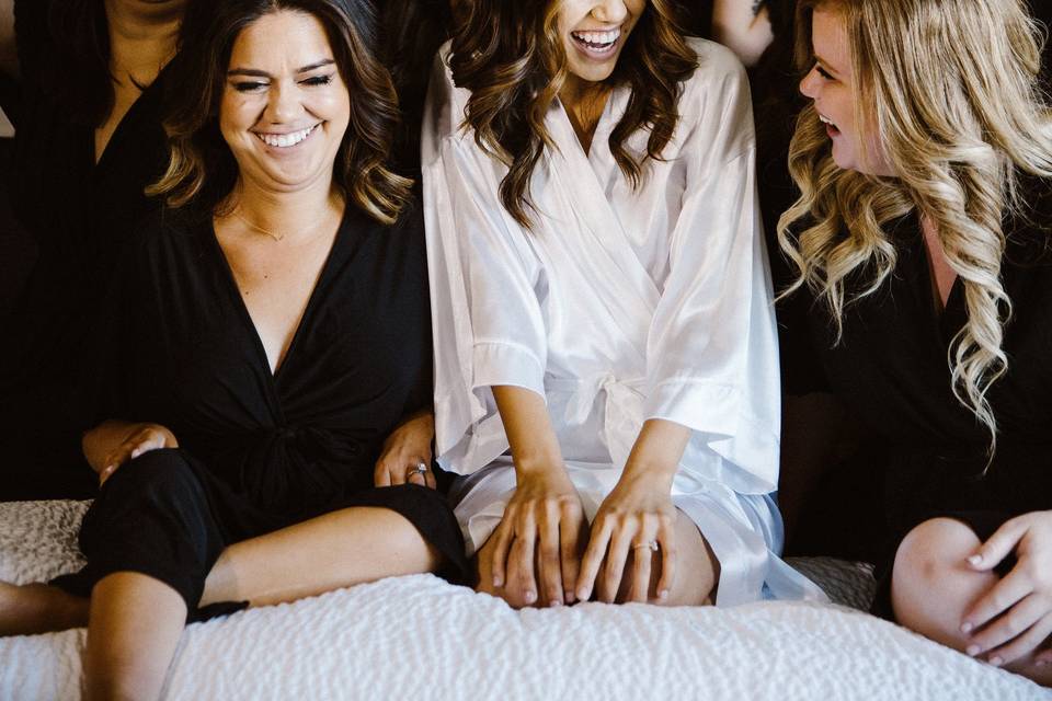 Bride and bridesmaids getting ready
