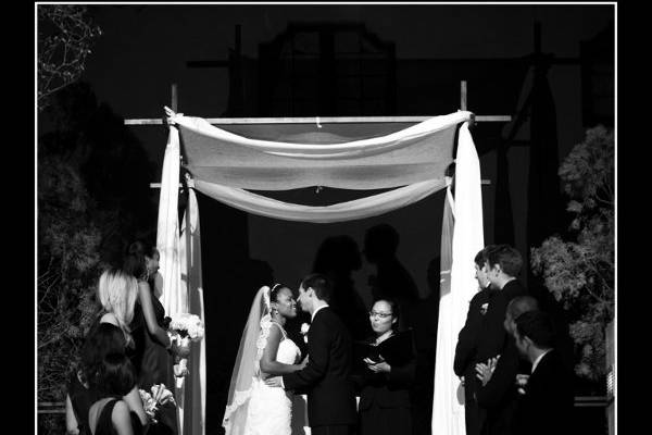 Wedding officiant for interfaith ceremony at Mission Inn in Riverside, CA.Photo by Dee Dee Dallas.