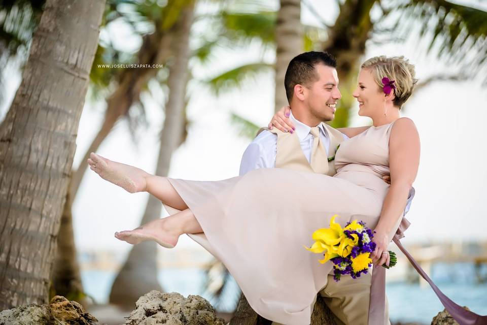 Carrying his bride