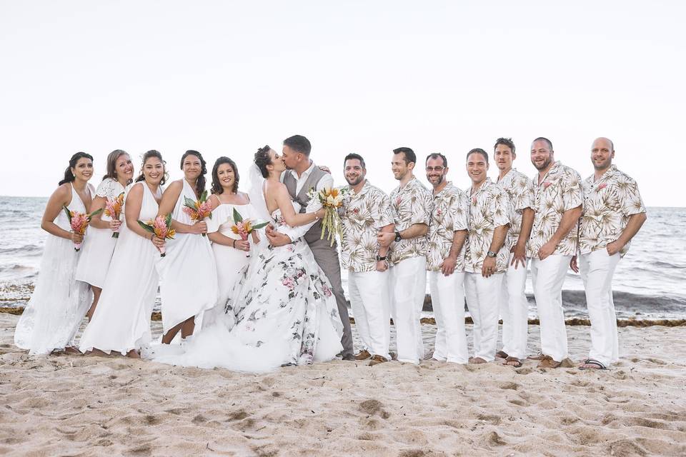 Newlyweds, bridesmaids, and groomsmen