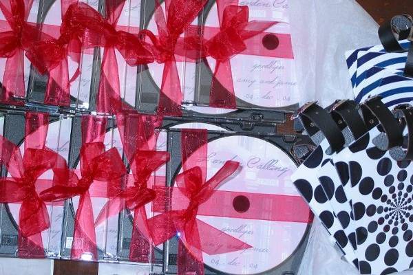 London Calling: Custom cd's and luggage tags to invite everyone to join the couple in London