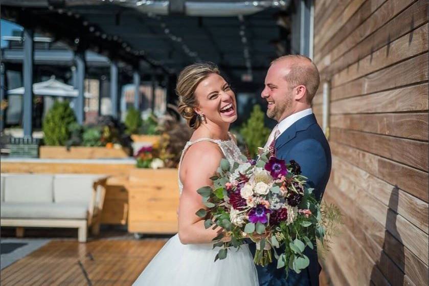 Laughing bride and groom