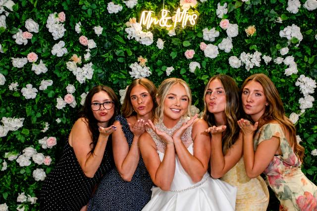 Bridesmaids Blowing Kisses