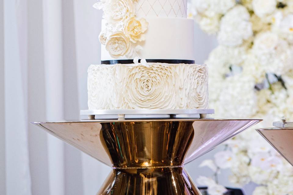 6 tier cake with sugar flowers