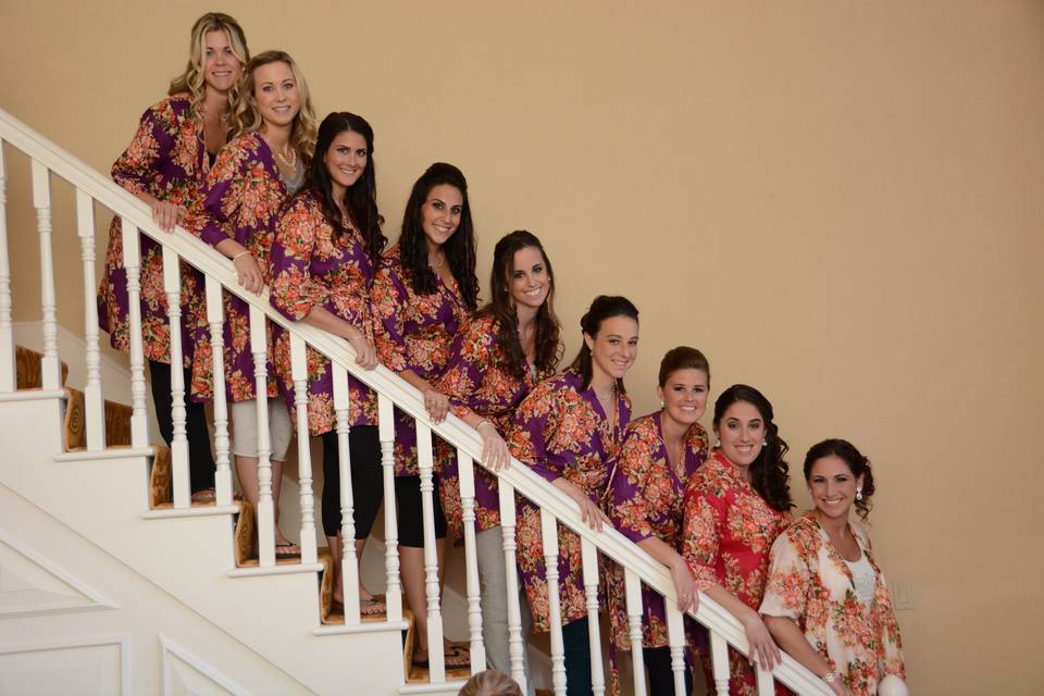 Bride and bridesmaids on the stairs