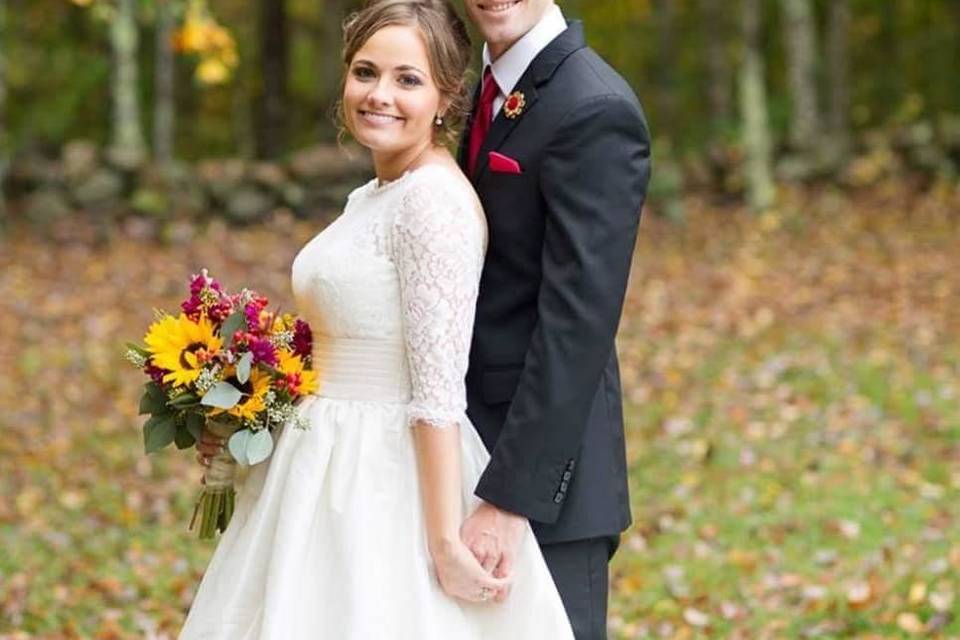 Newlywed couple in the woods