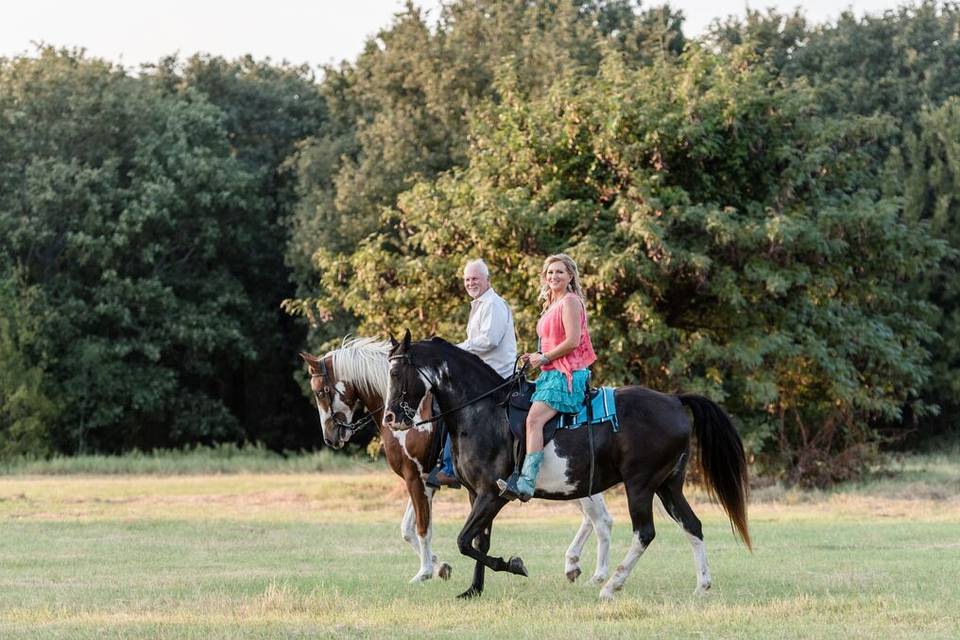 Couple riding horses