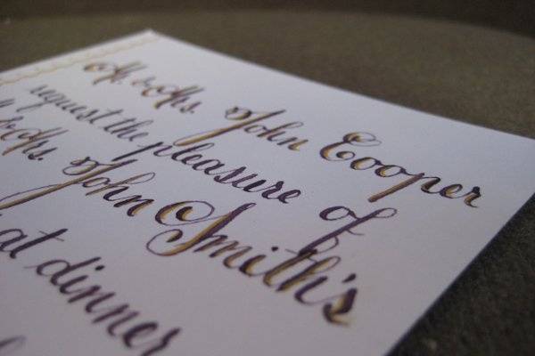 copperplate-lettered dinner invitation on bright white cotton stock