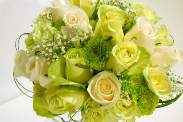Green and ivory roses with kermit mums.