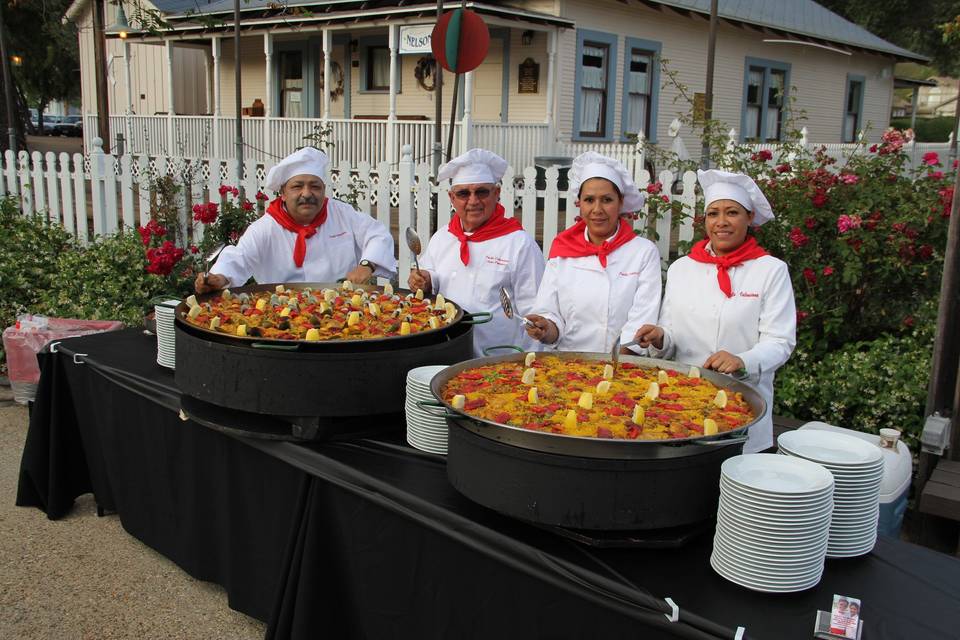The team from Paella Valenciana led by head Chef & Owner, Juan Pomares. Paella Valenciana: serving the Flavour of Spain. San Diego Paella Catering Company, Since 1977.