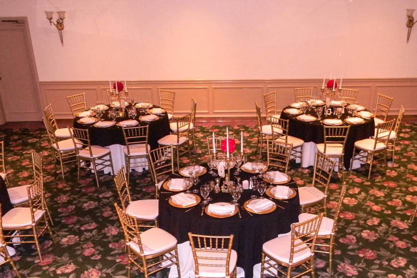 Champagne Room , Charger Plates, Gold Chiavari chairs,