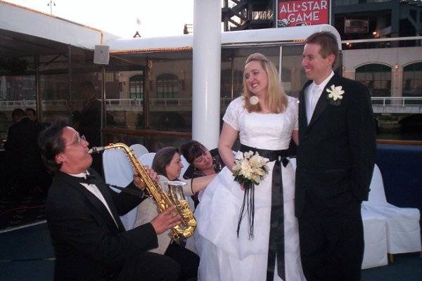 DJ Saxman Ken Stout performing Serenading Mr and Mrs Mark and Jennifer Benson on board the Commordore Yacht over looking the San Francisco Bay.