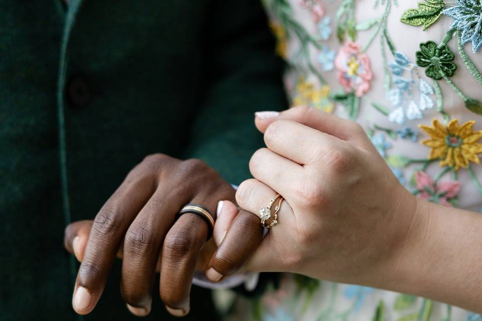 Close-up of newlyweds holding