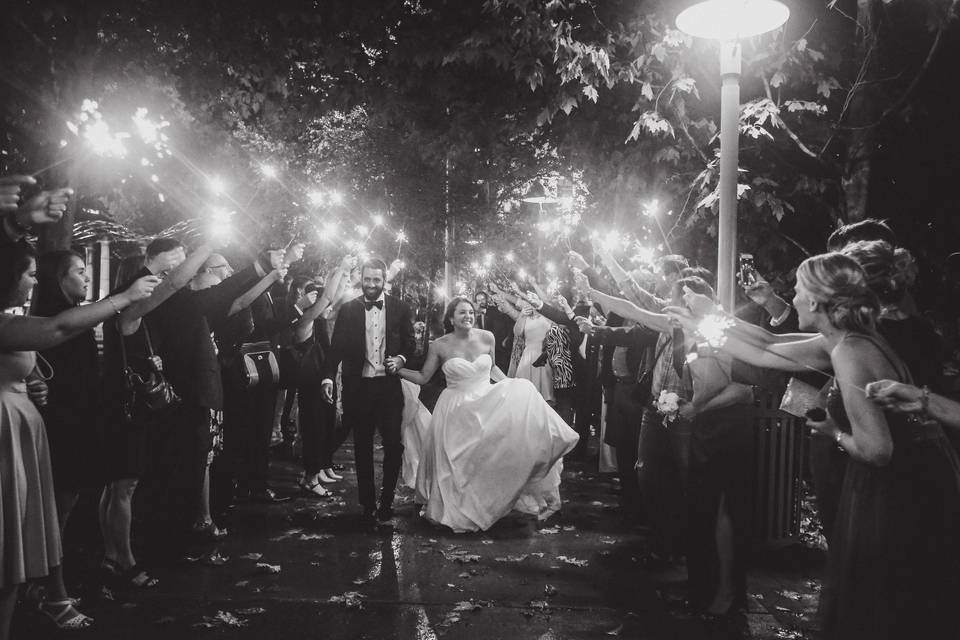 Exits with rain and sparklers!