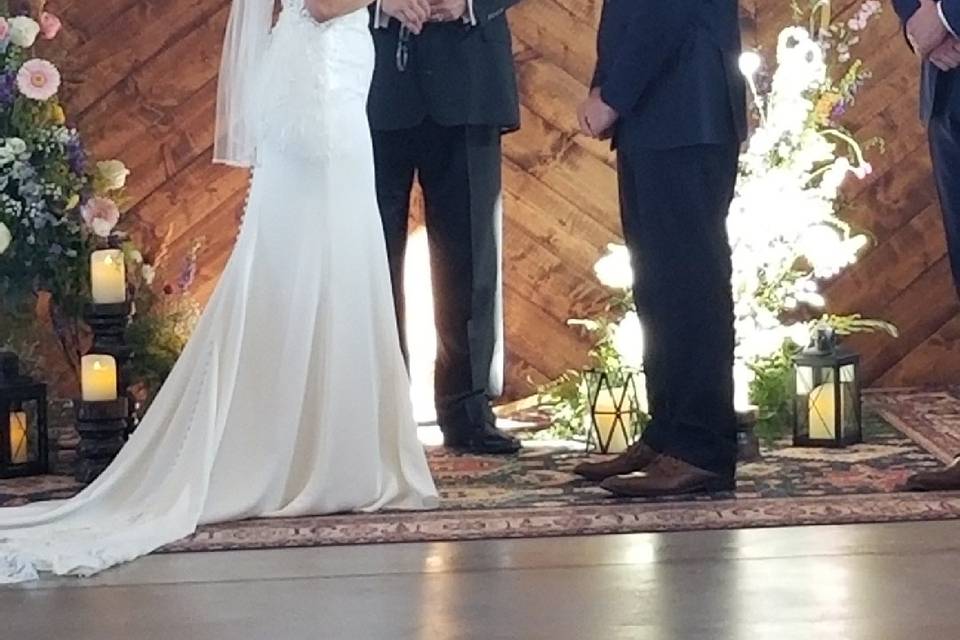 Saying their vows.