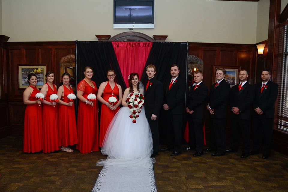 Newlyweds with bridesmaids and groomsmen