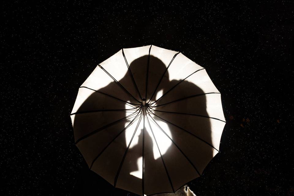 Silhouette Behind Umbrella