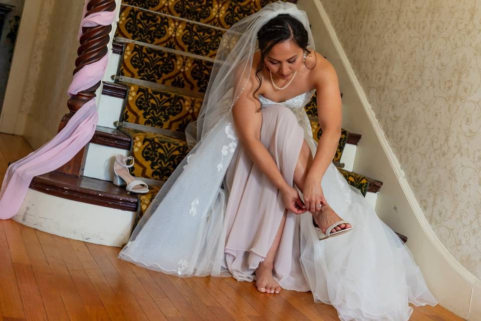Bride Putting on Heels