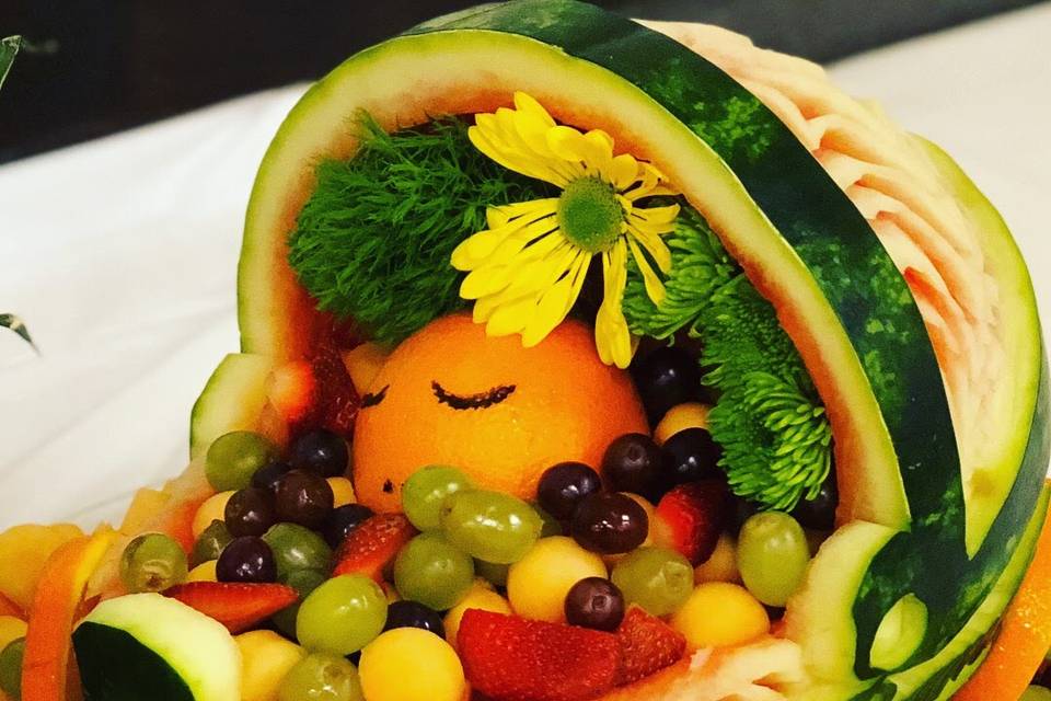 Baby carriage fruit carving