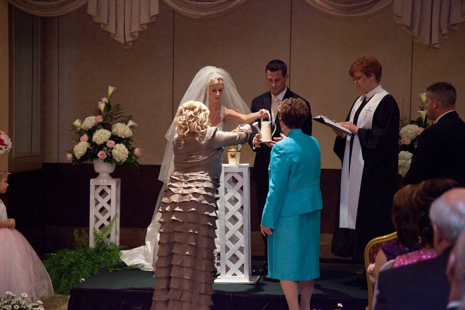 Unity Peace Lily Ceremony offers many levels of symbolization as the couple and family plant a lily!