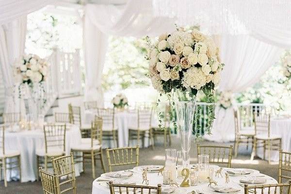 Formal, classic and elegant wedding reception in white, gold and blush.