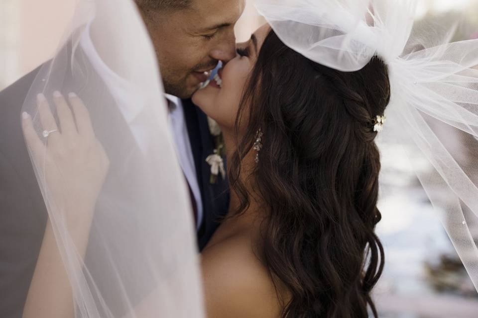 Newlyweds kissing