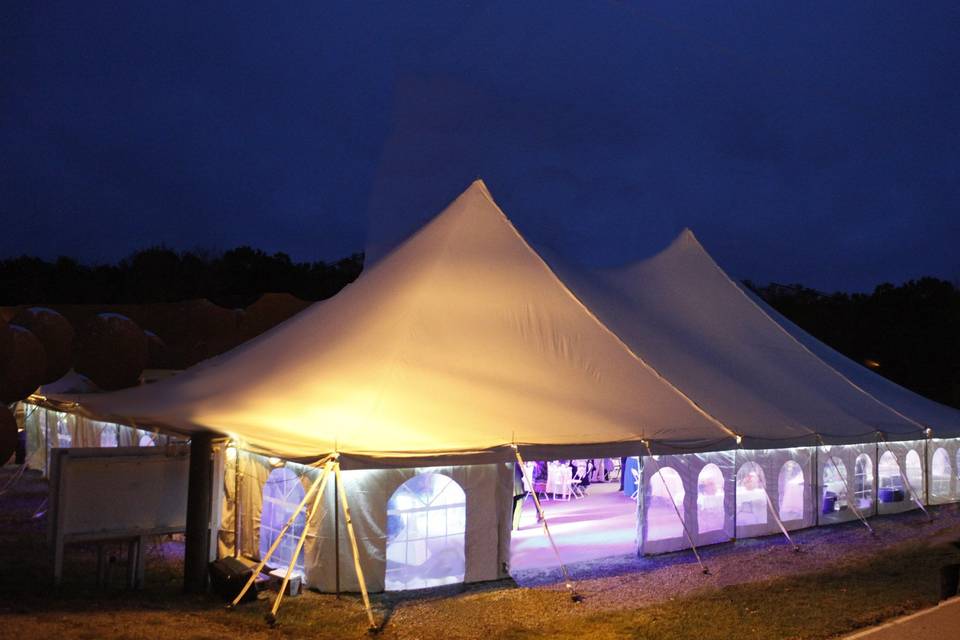 Reception tent at night.