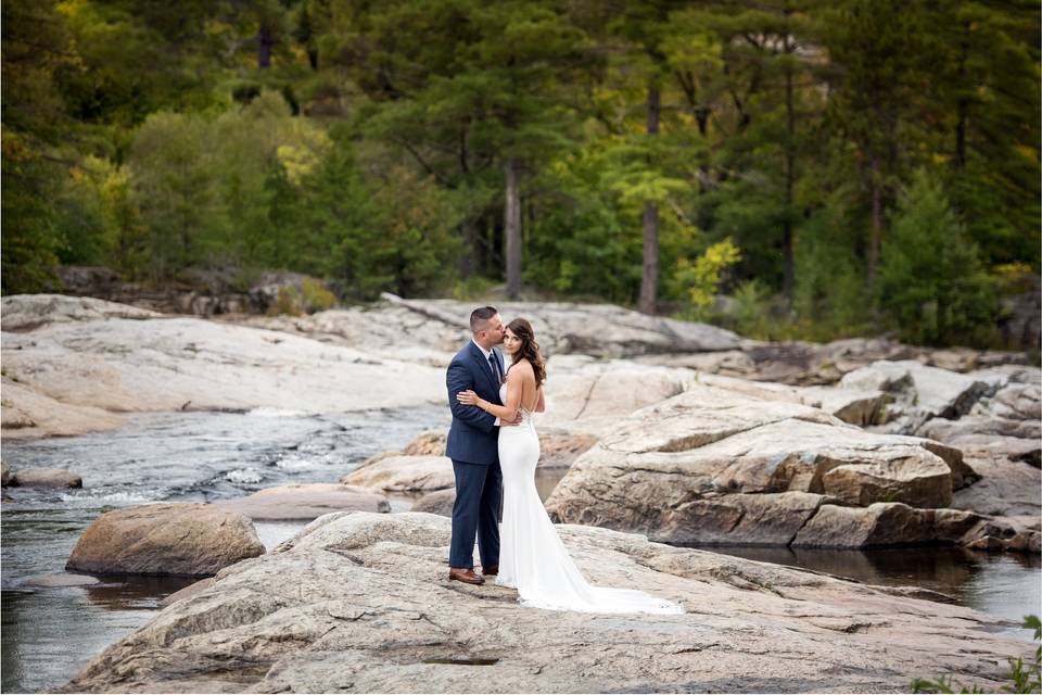 Bride and groom on the water