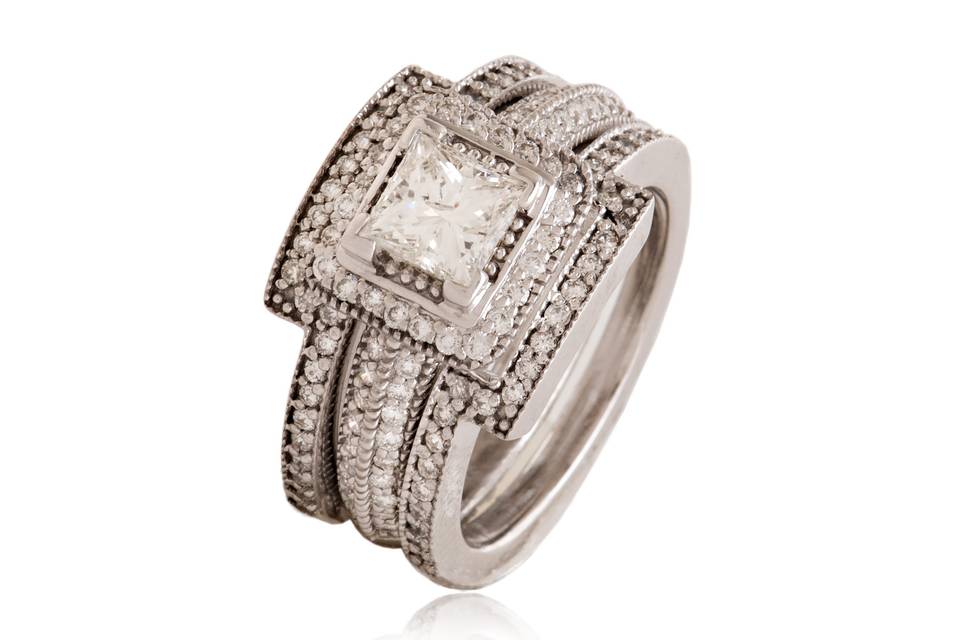 Style#R1516-14KW-S14K White gold engagement ring - Center Diamond 3/4CTW &  .01PTS Brilliant cut diamonds         Total weight .45ctw  I1-I2 Quality  - Wedding bands contains .40CTW Brilliant cut diamonds------------------------------------------------------------TWO INDIVIDUAL WEDDING BANDS .20CTW EACH. PRICE FOR EACH BAND $575.00 TOTAL COST FOR THE  SET  Price $4,650.00