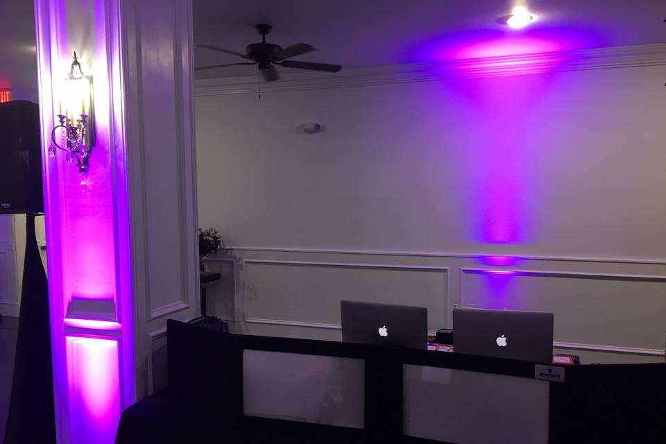 DJ booth & purple uplighting