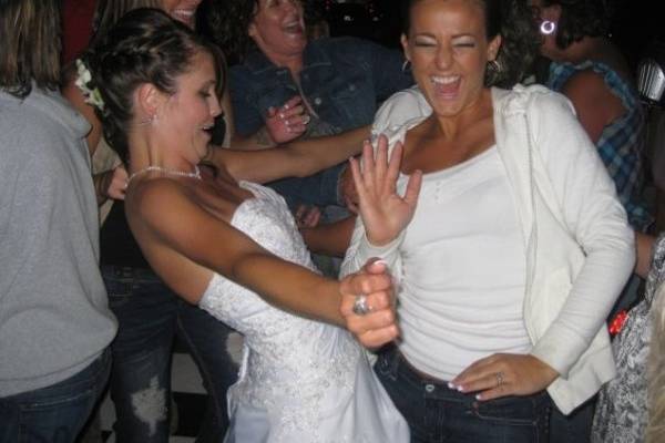 The bride dancing with guests