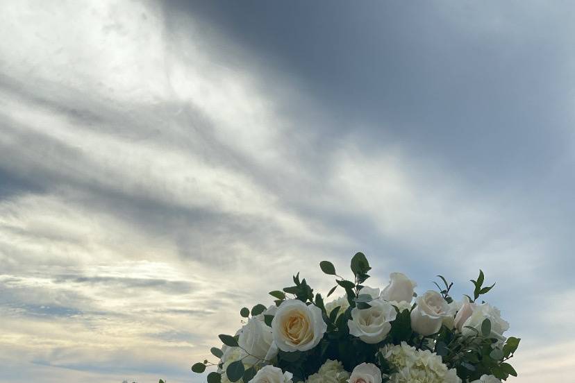 Tall ivory rose centerpieces