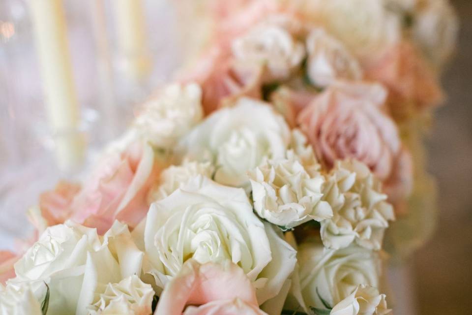 Lush sweetheart table flowers