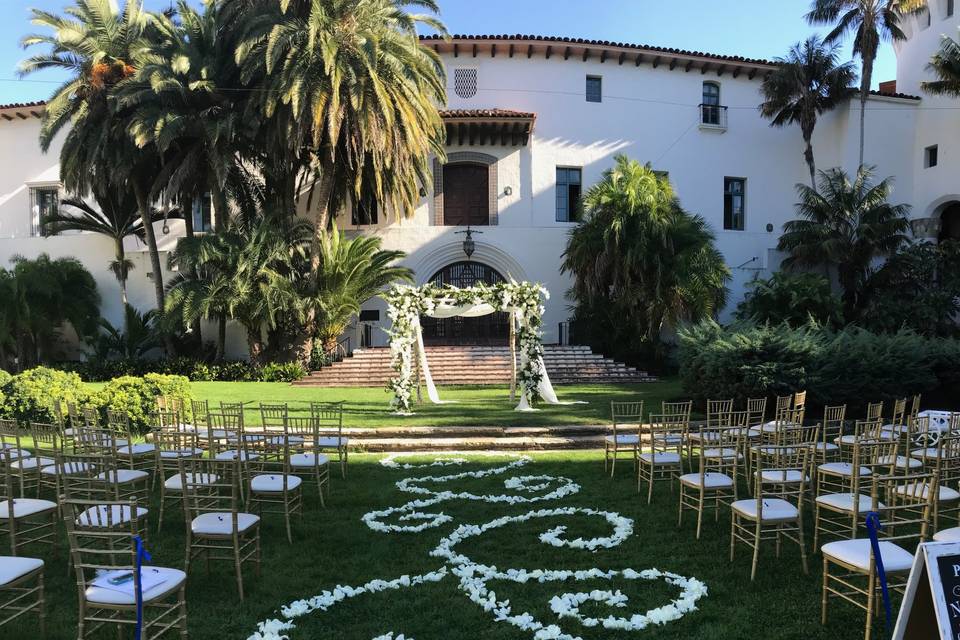 White rose petal aisle design