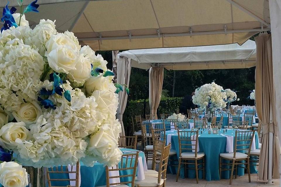 Large and tall white and blue wedding arrangement