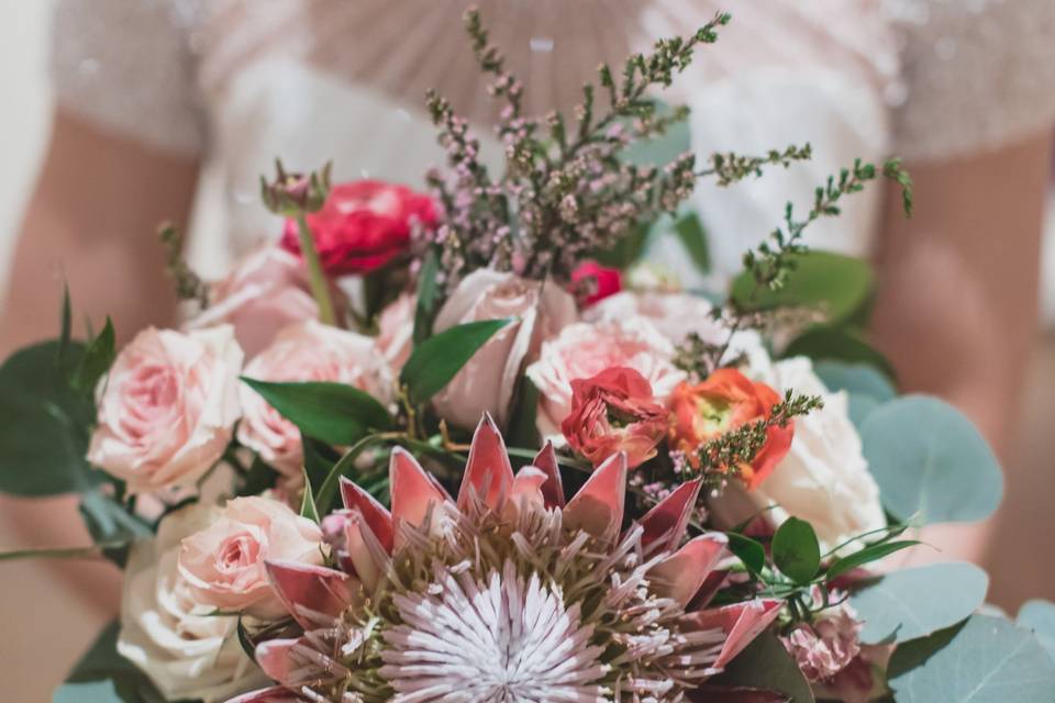 King protea flower roses and silver dollar greenery wedding bride bouquet