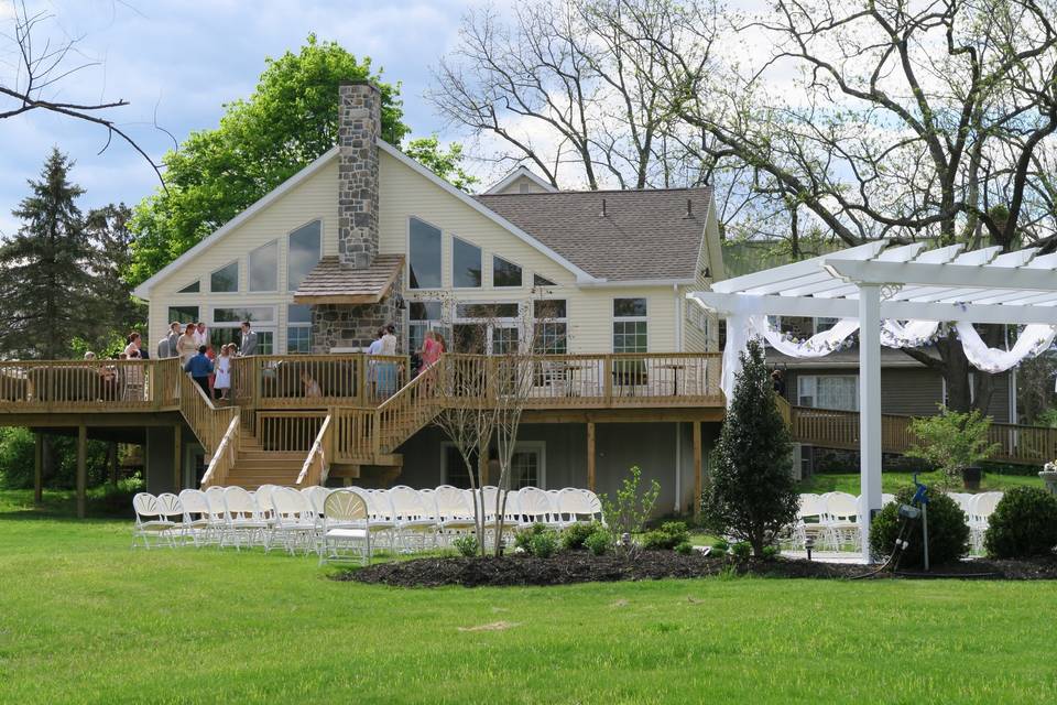 Pergola ceremony venue and back deck of Solarium