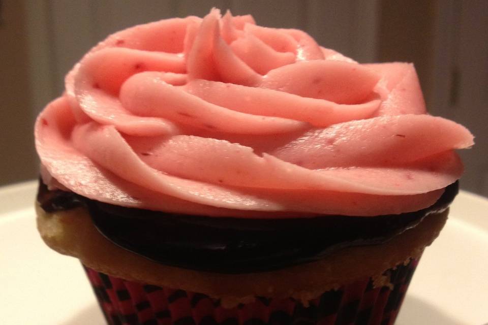 Neapolitan cupcake, perfect for bridal shower.  Fresh strawberry icing.