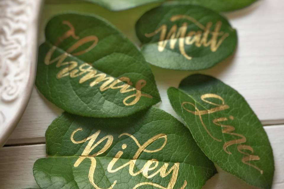 Creative name cards can be anything! Can't ever go wrong with greenery!