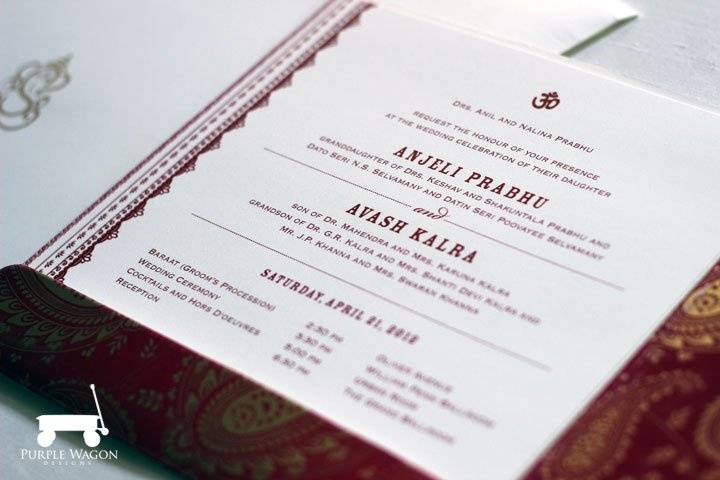 Wedding invitation in red and gold with Indian flair