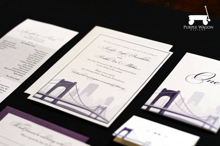 Wedding invitation and ceremony program with a Pittsburgh theme -- features the Pittsburgh skyline and Roberto Clemente Bridge