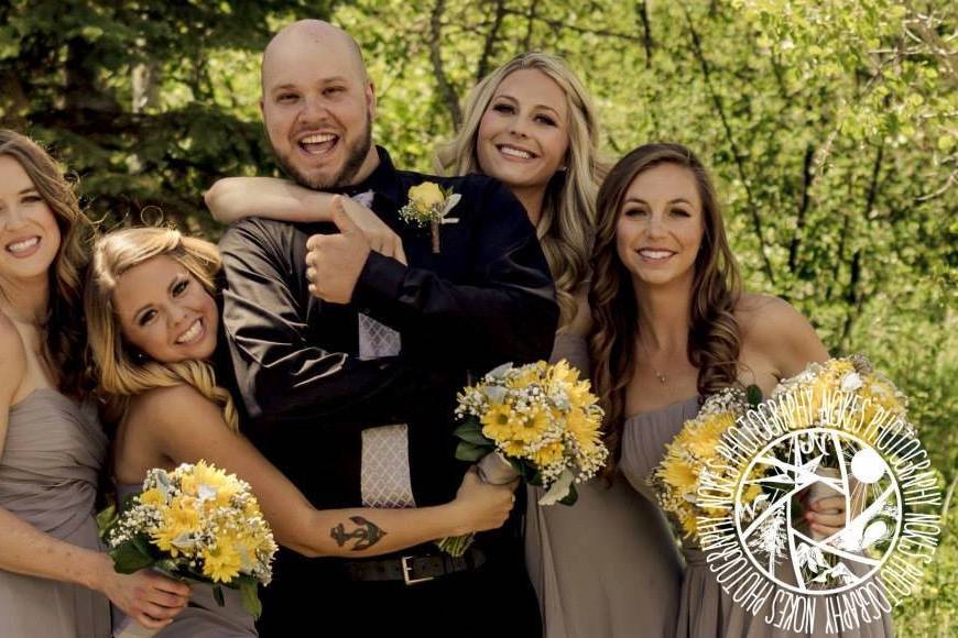 Groom with bridesmaids