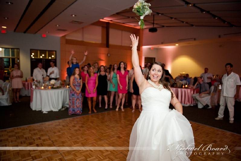 Throwing her bouquet