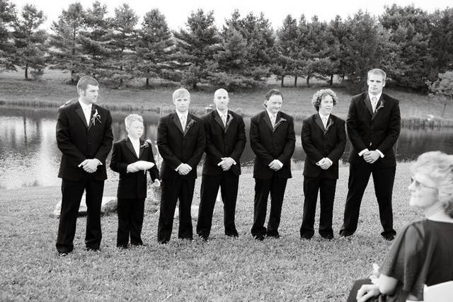 Groom with his groomsmen and ring bearer