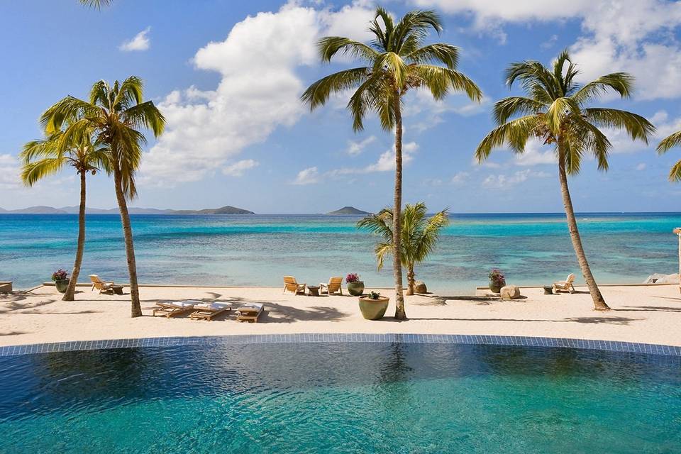 You’ll awaken to the sound of waves on the beach at Villa Aquamare on Virgin Gorda.