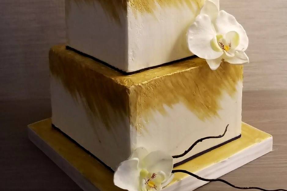 Square gold and white cake
