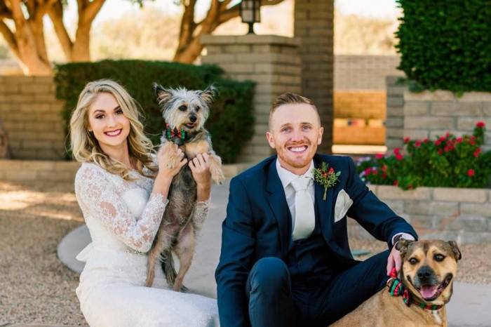 Couple portrait with dogs