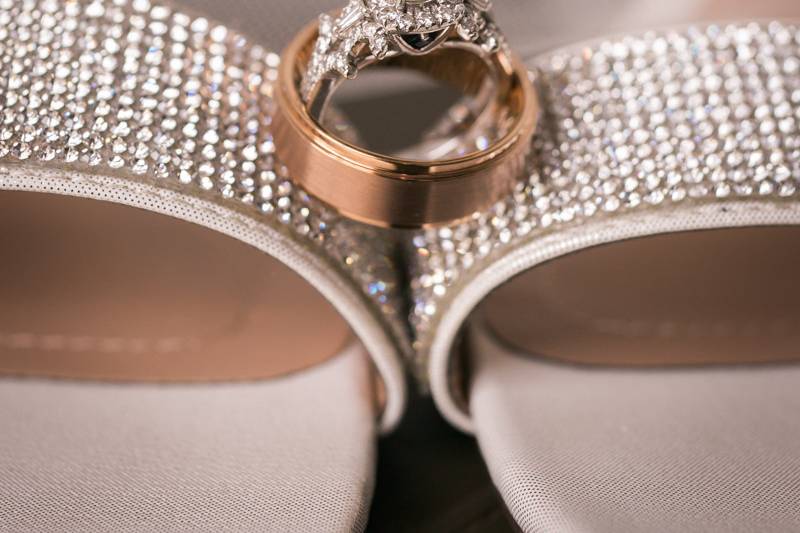 Wedding rings on brides shoes