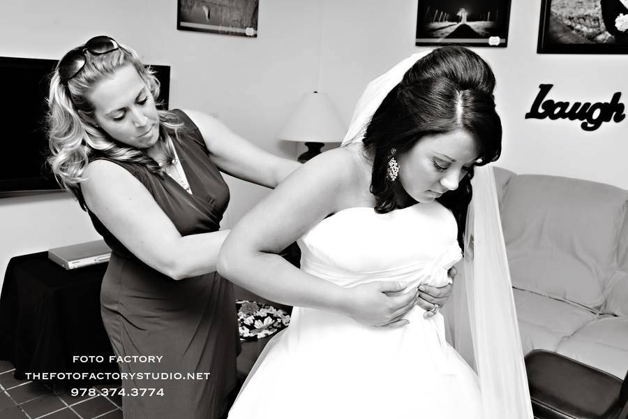 A rare behind-the-scenes look of Tiffany helping a beautiful bride into her dress! Such a special moment, very happy to have it captured by Foto Factory.